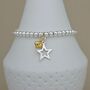 Bead Bracelet With Silver Star And Gold Plated Heart, thumbnail 2 of 3