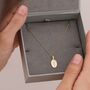 Personalised 9ct Gold Oval Charm Footprint Necklace, thumbnail 1 of 3