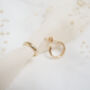 Solid Gold Engraved Star Huggie Hoop Earrings, thumbnail 4 of 12