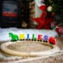 Personalised Brightly Coloured Dinosaur Wooden Train, thumbnail 1 of 3