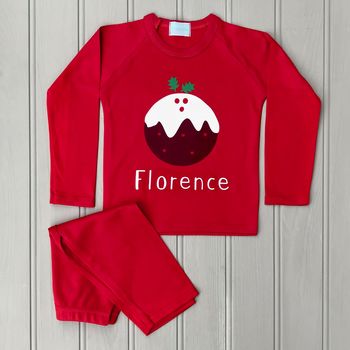 christmas pudding personalised pyjama and babygrow set by littlechook