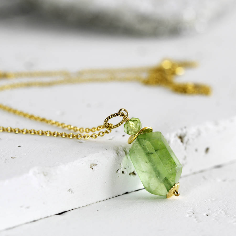 raw peridot pendant necklace by artique boutique