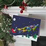 Santa's Sleigh Dinosaurs Christmas Card, thumbnail 1 of 2