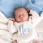 White Personalised Embroidered New Baby Name Long Sleeve Knitted Romper, thumbnail 1 of 12