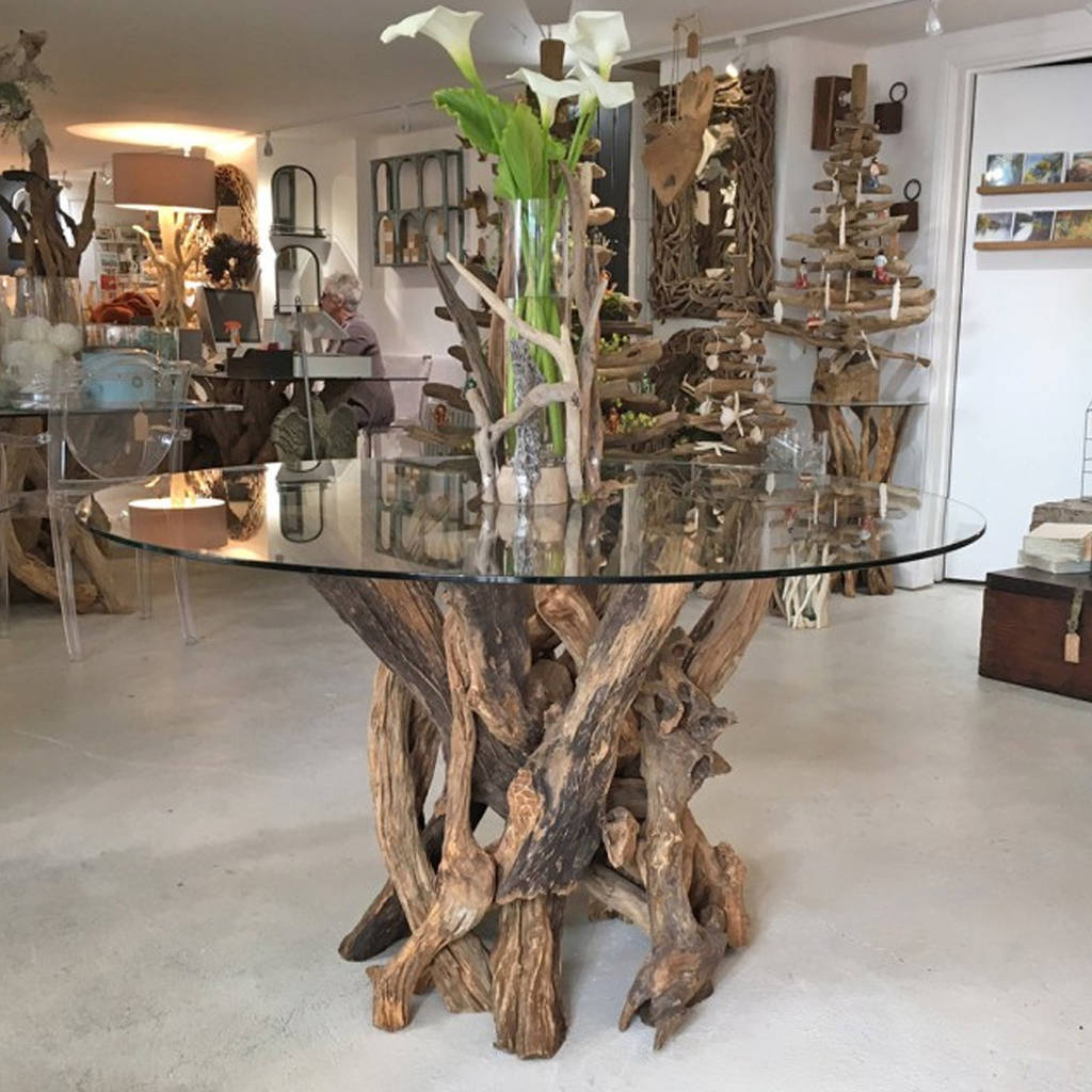 glass top dining table with driftwood base