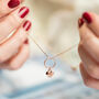Rose Gold Plated Circle Necklace With Heart Charm, thumbnail 1 of 6