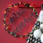 Feliz Navidad Holly Fairy Light Wreath, thumbnail 1 of 6