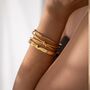 Two Molten 18k Gold Plated Waterproof Cuff Bracelets, thumbnail 1 of 3