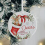 Personalised Baby's First Christmas Ceramic Bauble In Red, Pink Or Blue, thumbnail 1 of 6