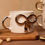 Gold Bow Tie Ribbon Mug With 24ct Gold Handle, thumbnail 1 of 8