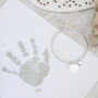 Sterling Silver Personalised Heart And Pearl Charm Bracelet With Prints, thumbnail 1 of 7