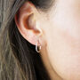 Sterling Silver Textured Huggie Hoop Earrings, thumbnail 1 of 8