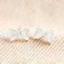 Sterling Silver Tiny Bow Stud Earrings, thumbnail 1 of 4