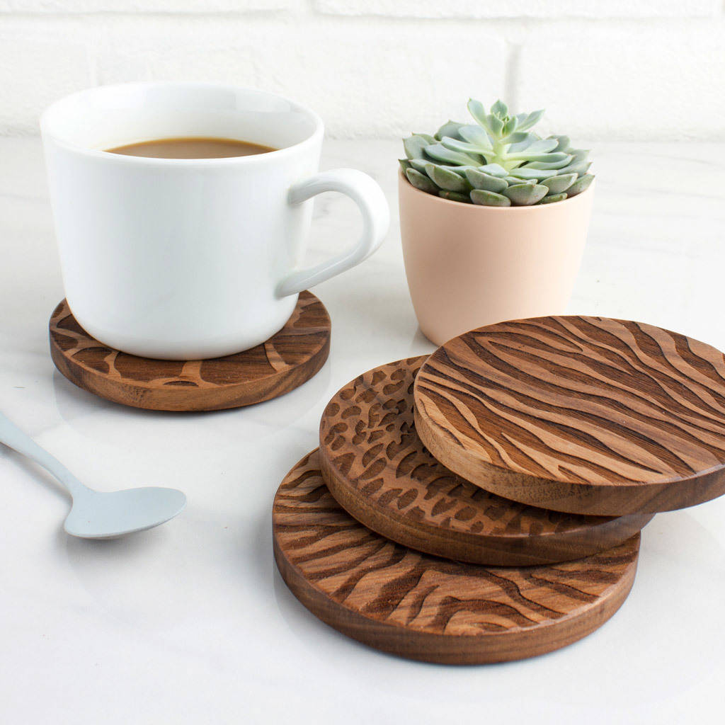 wood animal print coaster set by create gift love | notonthehighstreet.com