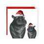Hippo And Baby Festive Red Hat Christmas Card, thumbnail 1 of 4