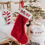 Personalised Christmas Stocking In Plush Red Or Grey, thumbnail 1 of 11