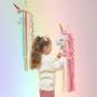 Kid's Christmas Unicorn Wall Hanging Interactive Toy, thumbnail 1 of 6