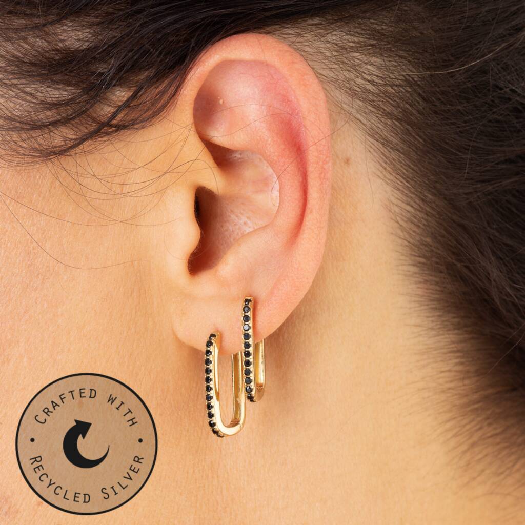 oval huggie hoop earrings with black stones by scream pretty