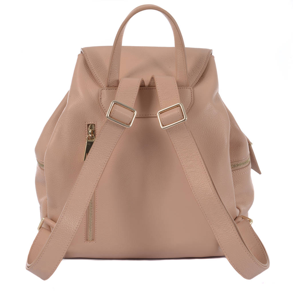 tan backpack changing bag