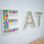 Felt Pom Pom Ball Filled Wooden 'Eat' Sign, thumbnail 2 of 7