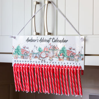 Personalised Candy Cane Advent Calendar Santa's Village, 3 of 5