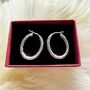 Oval Twisted Silver Hoop Earrings In Sterling Silver, thumbnail 2 of 2