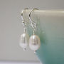 White Pearl Drop Earrings On Sterling Silver Hooks, thumbnail 1 of 6