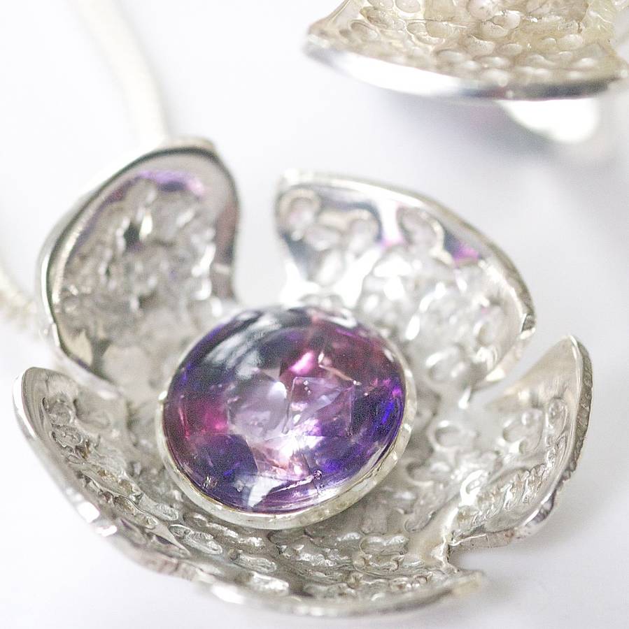 flower pendant made with swarovski crystals by caroline lukehurst