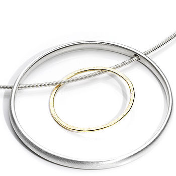 Gold And Silver Moving Circle Necklace, 2 of 3