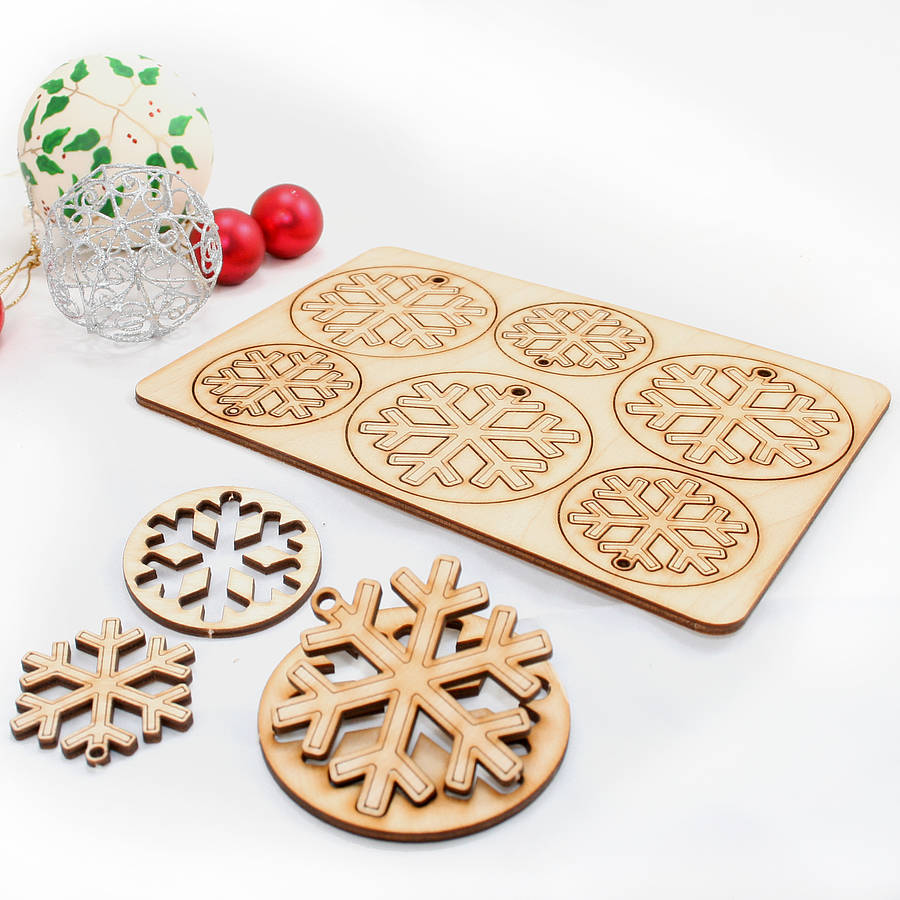 12 laser  cut  snowflake christmas  decorations  by cleancut 