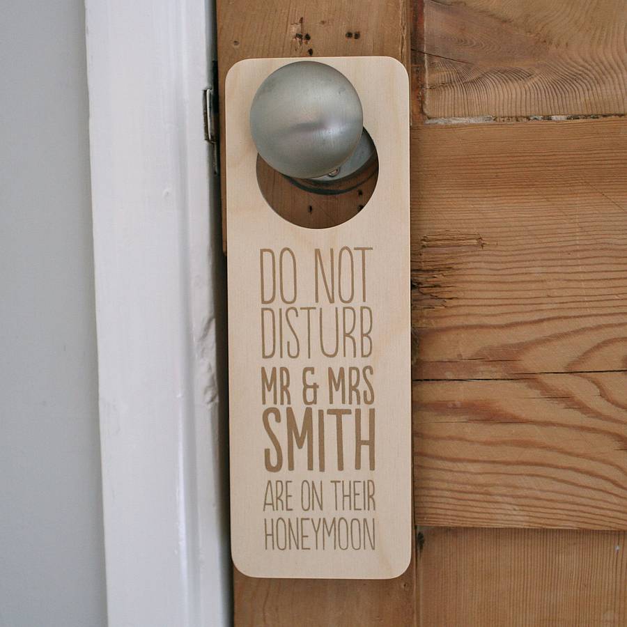 personalised honeymoon door hanger by the design conspiracy