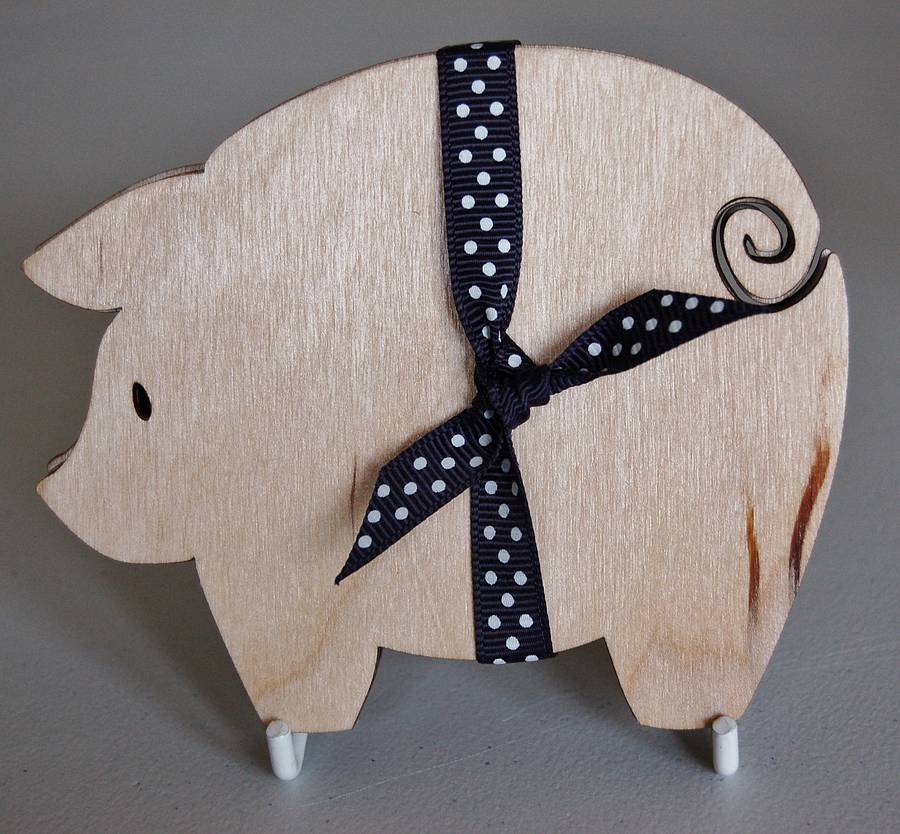 set of four wooden pig coasters by my blue dog | notonthehighstreet.com