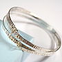 Hammered Spiral Bangle With Gold Heart, thumbnail 1 of 5