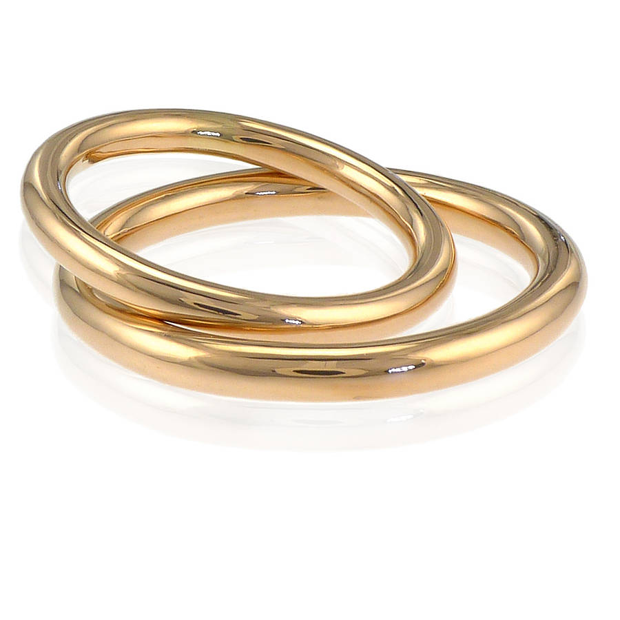  his  and hers  halo wedding  rings  in 18ct gold by lilia nash 