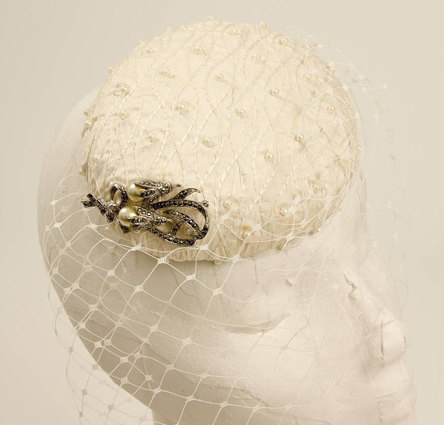 bridal hat with pearls and birdcage veil by the headmistress