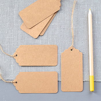 brown card luggage labels with string