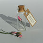 Tiny Personalised Rosebud In A Bottle, thumbnail 3 of 12