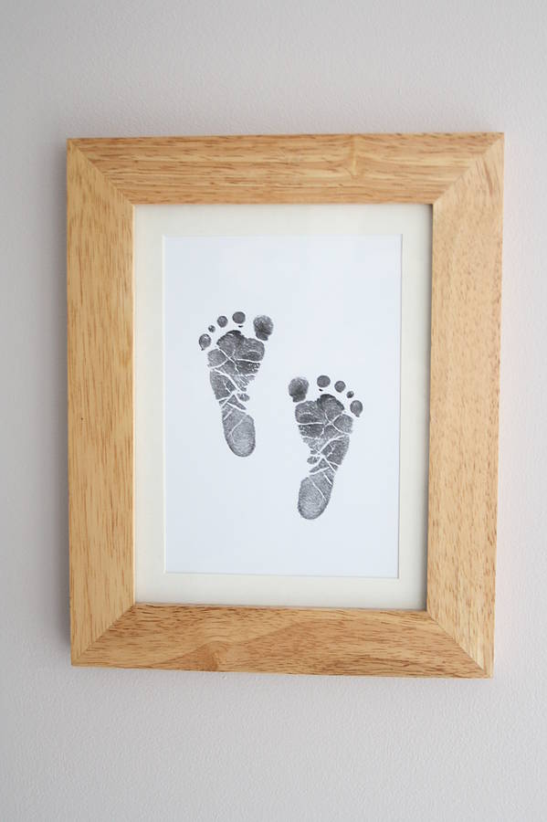 newborn hand and footprint