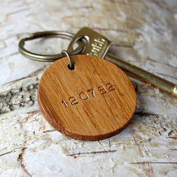 personalised date wooden circle keyring by clara and macy ...