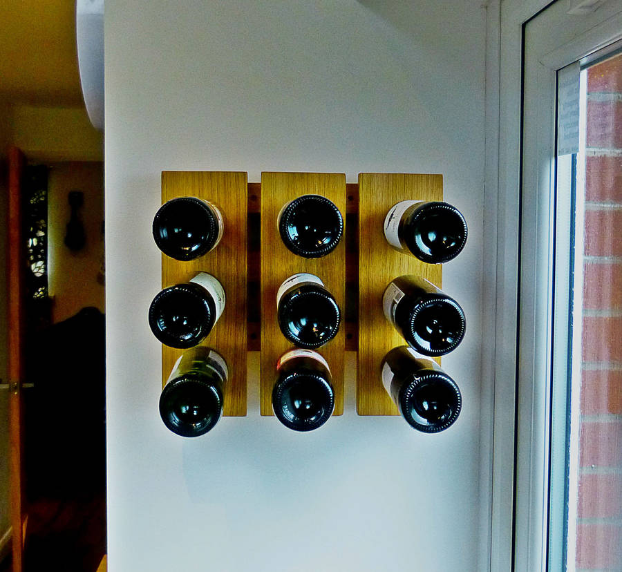 wine rack wall mounted handmade in solid oak by red thumb print
