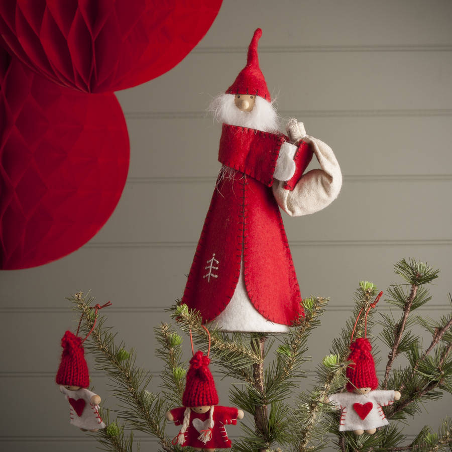 nordic angel tree topper by the christmas home | notonthehighstreet.com