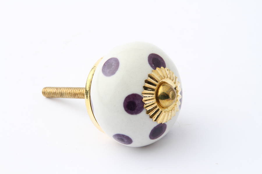 purple polkadot on white drawer knob by french grey interiors
