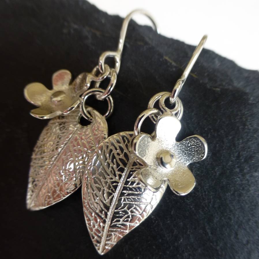 flower and leaf silver drop earrings by anne reeves jewellery