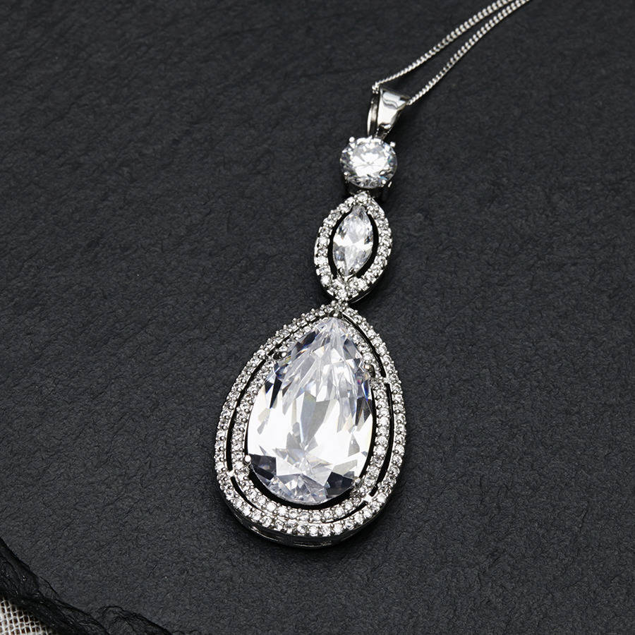 peardrop vintage style crystal pendant by queens & bowl