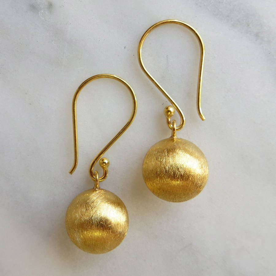 brushed gold puff ball drop earrings by gracie collins ...