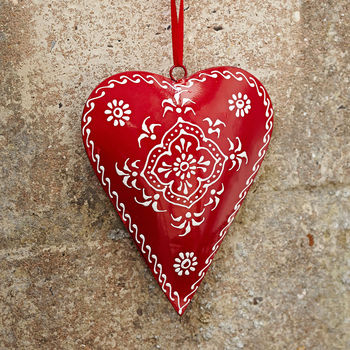 red recycled metal heart hanging by paper high | notonthehighstreet.com