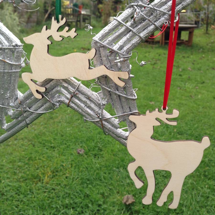 pair of prancing reindeer hanging christmas decorations by pair of prancing reindeer hanging christmas decorations by
