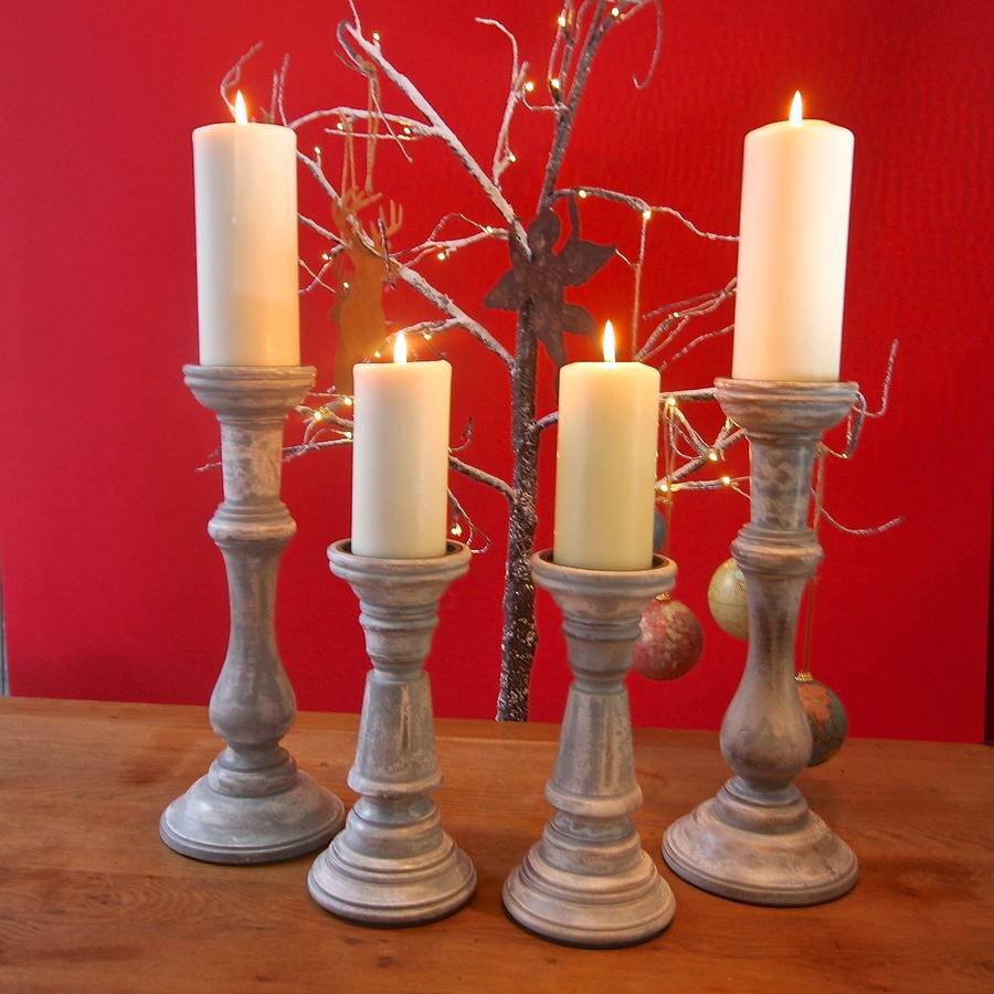 pair of wood candlesticks by london garden trading