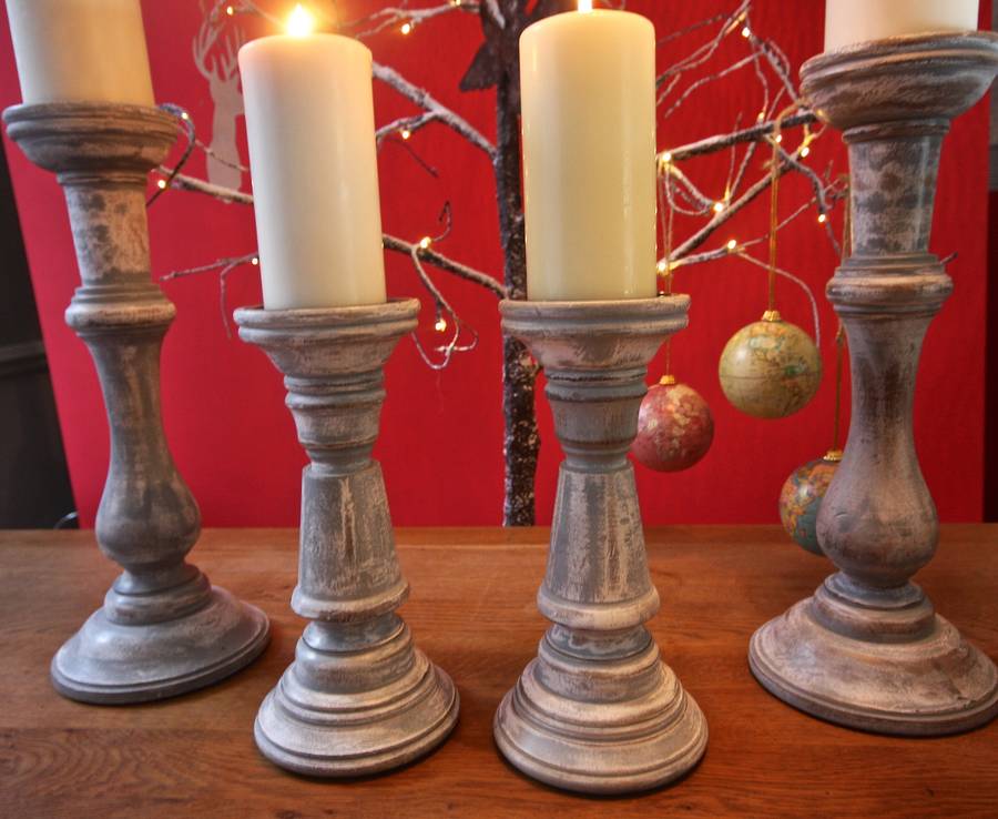 pair of wood candlesticks by london garden trading