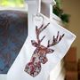 Personalised Winter White Red Paisley Reindeer Stocking, thumbnail 1 of 3